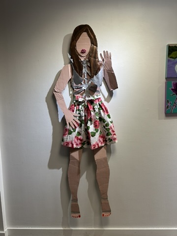 Mixed media cardboard figure installation